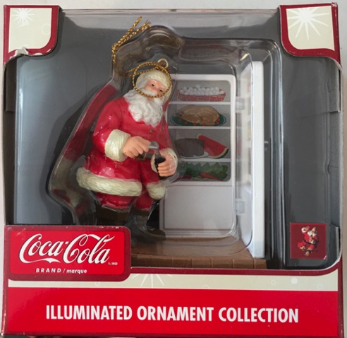 04524-1 € 12,50 coca cola ornament kan op  lichtsnoer aangesloten worden kerstman bij koelkast (  zonder doosje)